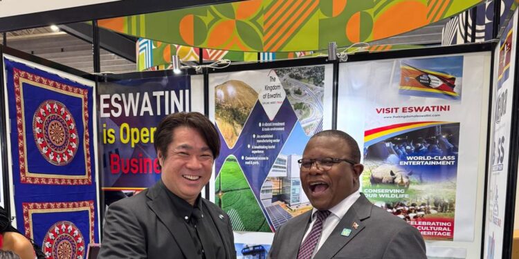 Minister Khumalo shakes hands with a private investor at Expo 2025 in Osaka