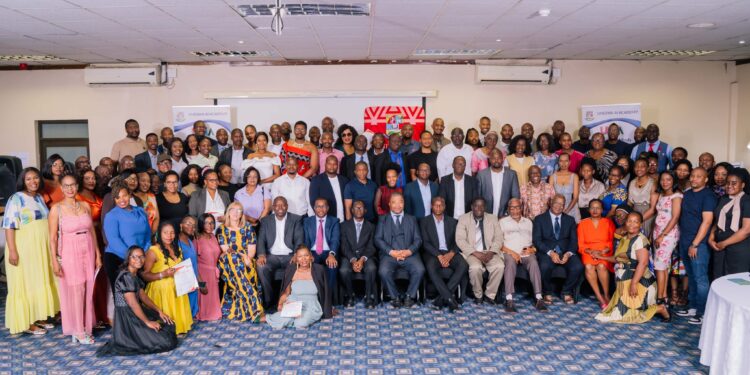 Graduates of the Generative AI for Educators and Mastering Generative AI for Professionals programs pose with the Vice Chancellor during the completion ceremony at the University of Eswatini.