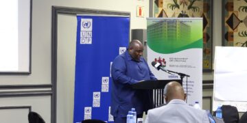 Principal Secretary Kanono Ramashamole addressing stakeholders at the Digital Public Infrastructure workshop in Maseru.