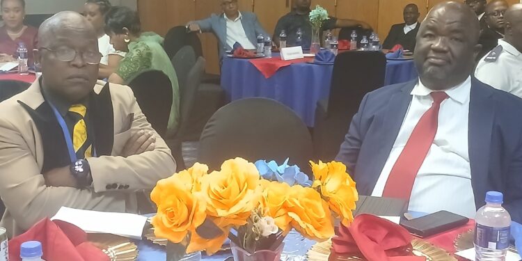 Minister of Education and Training Owen Nxumalo with the delegates to the COSSASA games during the official welcome dinner at the George Hotel in Manzini