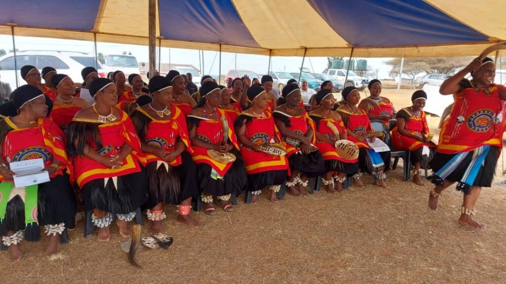 Graduates of the Rural Health Motivator training seated during the ceremony at Mahlalini Area Programme offices.