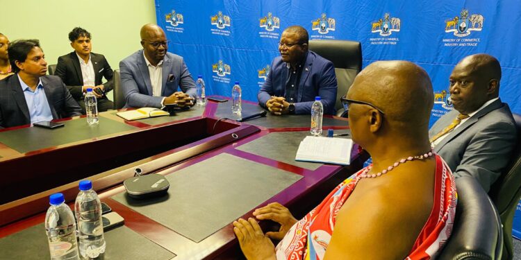 Minister of Commerce Manqoba Khumalo with Amandla Omnotho President Gugulethu Xaba and other officials during a boardroom-style meeting to announce the Sigwe footwear factory project.