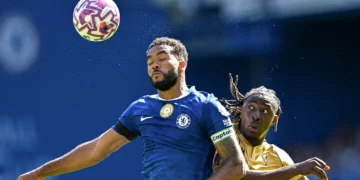 Eberechi Eze of Crystal Palace challenges Reece James for possession during the London derby at Stamford Bridge.
