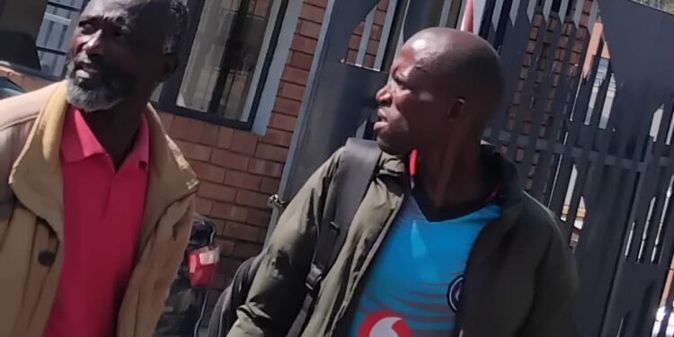 Douglas Gamedze leaving court after being fined for assaulting his wife in a self-defence claim.