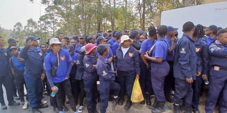 EMRC students picket outside the Ministry of Labour, demanding clarity on book allowances.