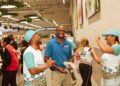 FNB Eswatini officials and customers during the Swipe for the Win campaign activation at Spar Matsapha Lifestyle.
