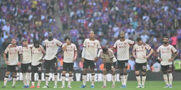 Liverpool players look forward to the penalty shoot out during the English FA Community Shield football match against Crystal Palace at Wembley Stadium, in London on Sunday. Photo: Glyn KIRK / AFP