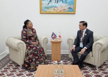 Minister of Foreign Affairs and International Cooperation Pholile Shakantu and Turkmenistan’s Foreign Minister Rasit Meredow exchange documents after signing a diplomatic relations protocol in Awaza, Turkmenistan.