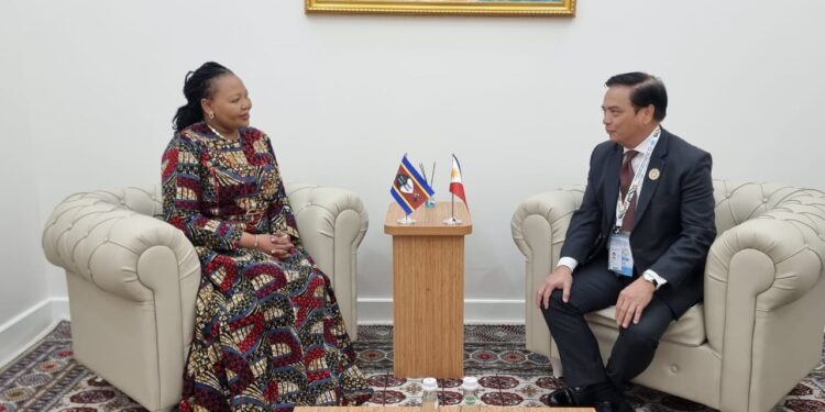 Minister of Foreign Affairs and International Cooperation Pholile Shakantu and Turkmenistan’s Foreign Minister Rasit Meredow exchange documents after signing a diplomatic relations protocol in Awaza, Turkmenistan.