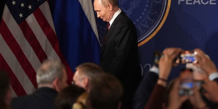 Russia's President Vladimir Putin departs following a joint press conference with President Donald Trump at Joint Base Elmendorf-Richardson, Alaska, on Friday. Jae C. Hong/AP