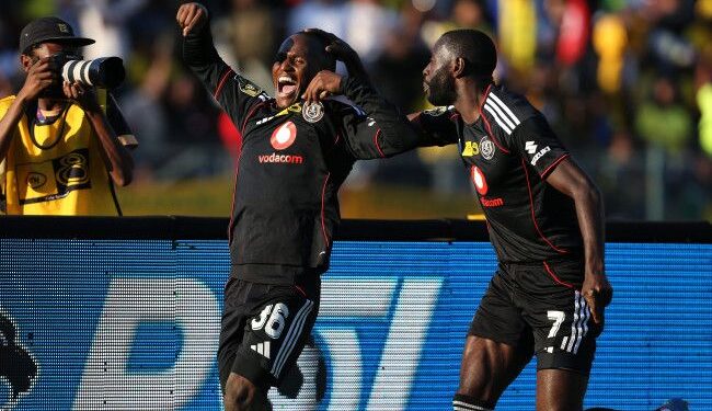 Kamogelo Sebelebele and Deon Hotto celebrate after Pirates equalised against Sundowns in the MTN8 semi-final. Photo by Daniel Hlongwane/Gallo Images