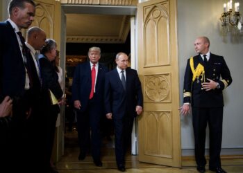 US President Donald Trump and Russia's President Vladimir Putin arrive for a meeting at Finland's Presidential Palace in Helsinki, Finland, on July 16, 2018. Brendan Smialowski/AFP/Getty Images/FILE