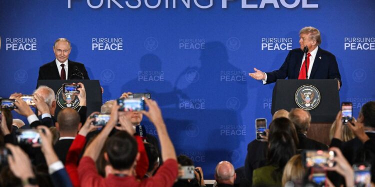 Russian President Vladimir Putin delivers remarks during Friday's briefing. Al Drago/Bloomberg/Getty Images