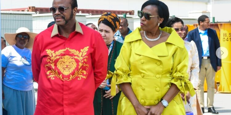 Inkhosikati LaMotsa spotted wearing a chartreuse iridescent Thula Sindi off-shoulder satin dress during a visit to Turkmenistan alongside His Majesty King Mswati III. The stunning design, by the acclaimed South African designer, Thula Sindi.