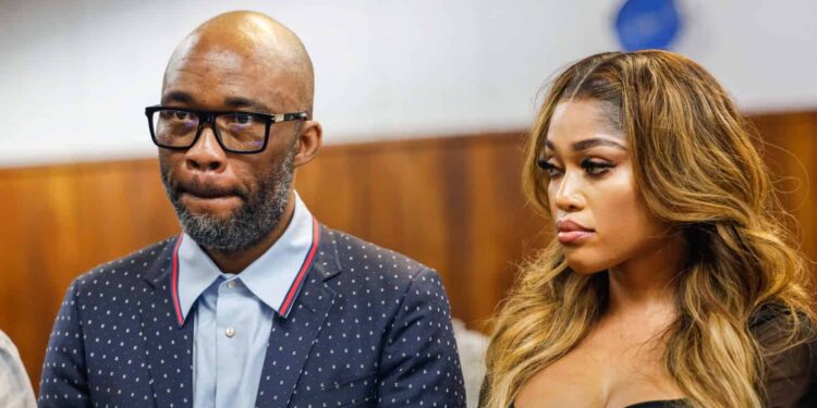 Vusumizi “Cat” Matlala and his wife, Tsakani at Alexandra Magistrate’s Court on August 26, 2025 in Johannesburg, South Africa. Matlala and four co-accused face charges of attempted murder, conspiracy to commit murder, and money laundering over the alleged hit of socialite Tebogo Thobejane. (Photo by Gallo Images/Sharon Seretlo)