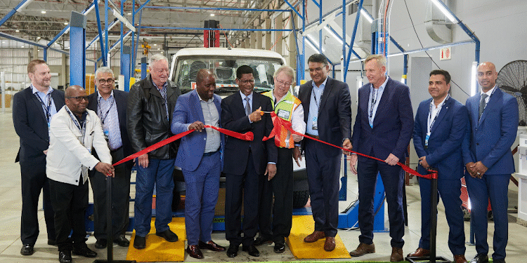 Representatives of Dube TradePort, KZN provincial government, Mahindra & Mahindra, Mahindra South Africa, AIH Logistics and eThekwini opening the plant. Image: Supplied
