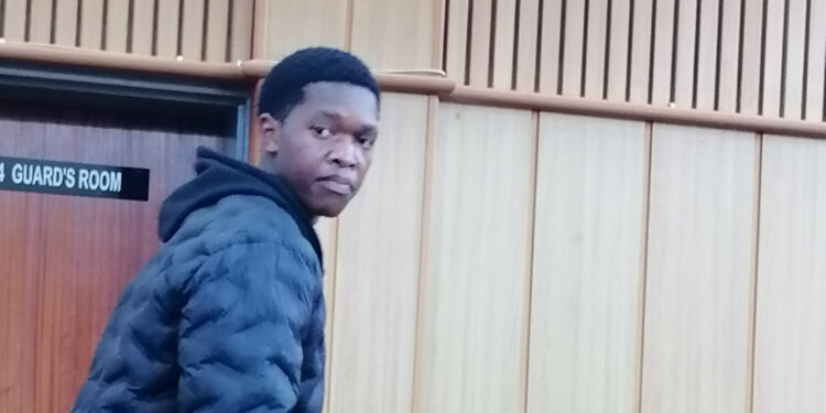 Siyandziswa Simelane listens to proceedings at the Mbabane Magistrates Court after pleading guilty to dagga possession.
