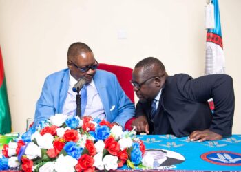 DPP spokesperson Shadric Namalomba with party leader Peter Mutharika during a campaign event