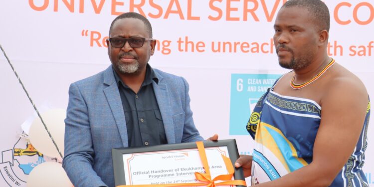 World Vision Eswatini National Director Amos Zaindi with Minister of Tinkhundla Development and Administration Skhumbuzo Dlamini during the official handover of development initiatives at Ekukhanyeni Inkhundla