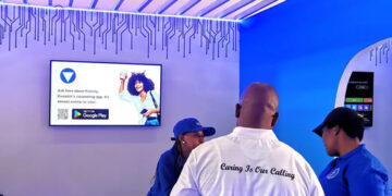 Visitors explore the Ridesly stand at the Eswatini International Trade Fair.