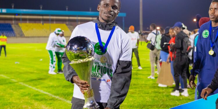 Thando Langa beams with pride as he lifts his first trophy in 13 years, with a gold medal hanging around his neck after Nsingizini Hotspurs’ 1-0 victory over Green Mamba.