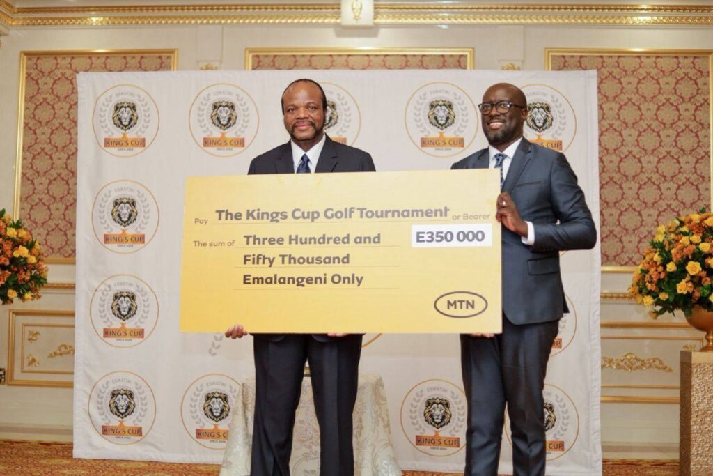 His Majesty King Mswati III receives a sponsorship cheque