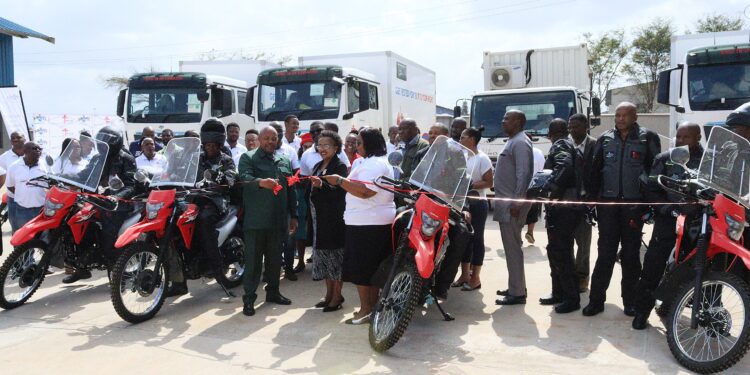 Minister Mduduzi Matsebula commissioning TB screening trucks and motorbikes at a ceremony. Photo by Ministry of Health