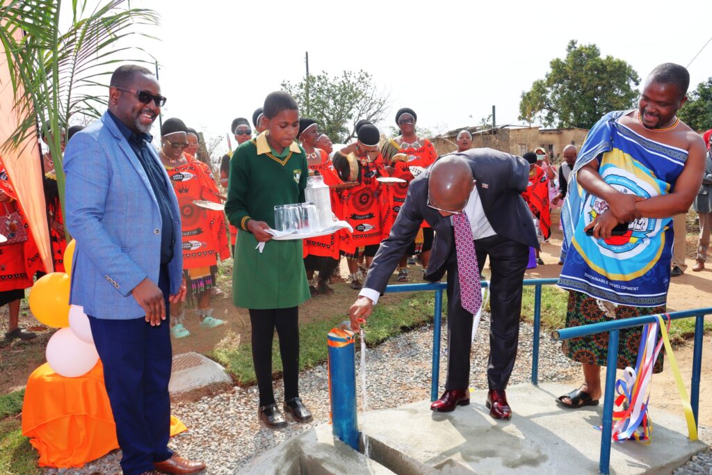 World Vision Eswatini National Director Amos Zaindi with Acting Minister of Natural Resources and Energy Appolo Maphalala and Minister of Tinkhundla Development and Administration Skhumbuzo Dlamini during the commissioning of the Nkiliji Water Scheme at Ekukhanyeni