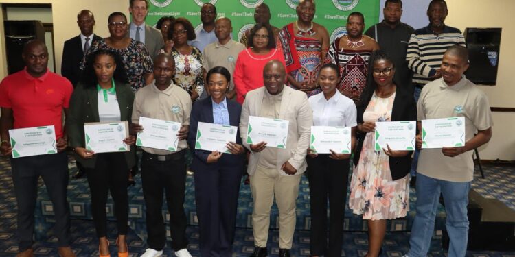 Participants of the World Ozone Day commemoration join Minister Jane Mkhonta-Simelane for a group photo after unveiling Eswatini’s amended Ozone Regulations.