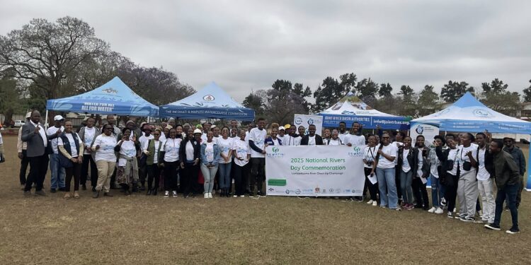 Participants of Eswatini’s first World Rivers Day Clean-Up Campaign gather along the Lutsantsama River in Matsapha