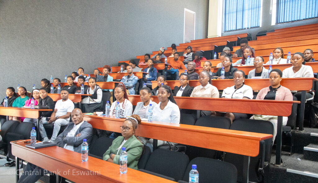 Students and participants of the UNESWA Economics Society Mentorship Programme listening during the launch held at the University of Eswatini.