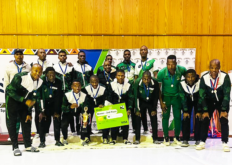 Correctional Sunrise Volleyball Club teams celebrate their success in Lesotho after reaching the finals