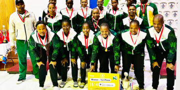 Correctional Sunrise Volleyball Club teams celebrate their success in Lesotho after reaching the finals
