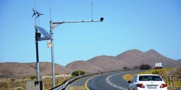 A car cruises past speed AOD cameras on a South African highway in the Western Cape