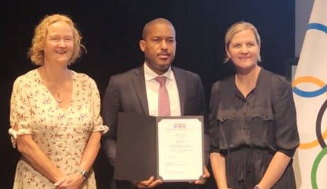 EOCGA CEO Maxwell Jele proudly holds his MEMOS certificate after graduating with distinction in Lausanne, Switzerland.