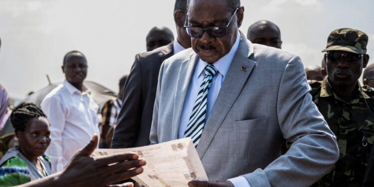 Malawi's presidential candidate and leader of the Democratic Progressive Party Peter Mutharika inspects a ballot paper before casting his vote during the general election at Thyolo District, south of Blantyre, Malawi, September 16, 2025. REUTERS/Stringer/File Photo