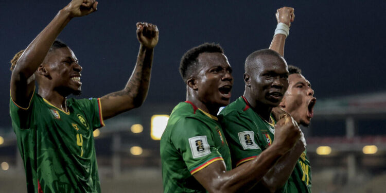 Cameroon players celebrate after extending their lead against Eswatini in the World Cup qualifier.