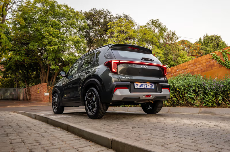 Rear: Stylish tailgate with practical storage and safety features.