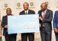 His Majesty King Mswati III receives a E1.2 million sponsorship cheque from ESRIC officials in support of the 2025 King’s Cup Golf Tournament.