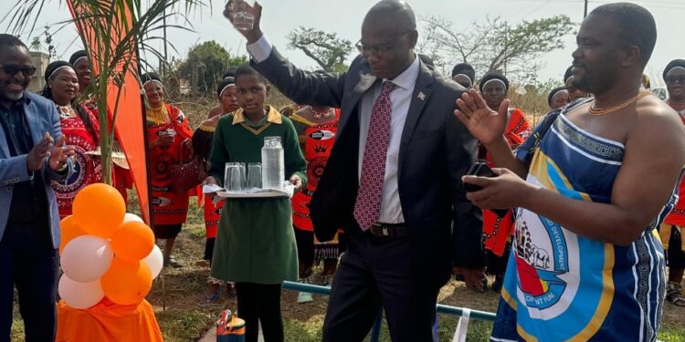 World Vision director, Acting Minister Appolo Maphalala, and Minister of Tinkhundla Administration and Development, Honourable Sikhumbuzo Dlamini, during the commissioning of the Ekukhanyeni Water Scheme.