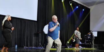 Philmon Gama, founder of the Albinism Society of Eswatini, performing his song Mfati Wami with veteran musician Mshikishi Mdnzebele during the Disability Arts Festival 2025.