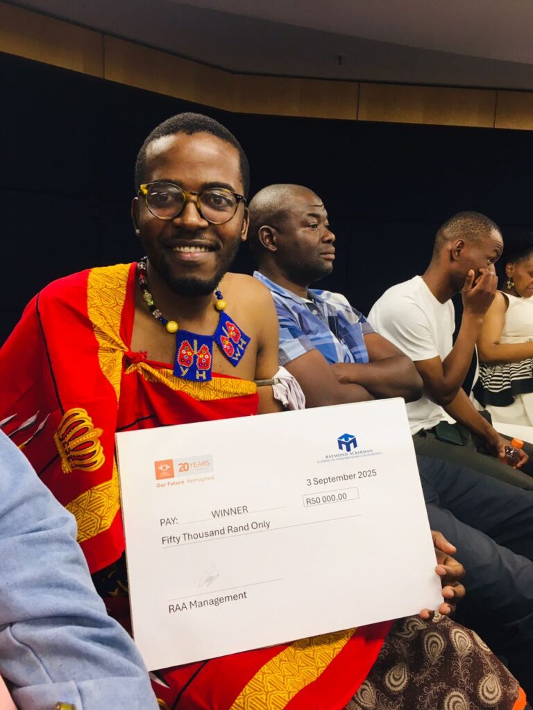 Siphiwo Lushaba proudly holds the Raymond Ackerman Academy Alumni Award for Leadership Excellence after receiving it in Johannesburg.