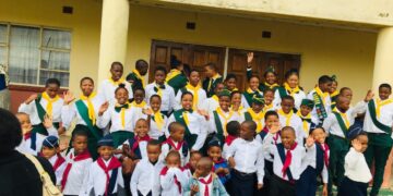 Young Pathfinders proudly wear their scarves, symbolizing faith, service, and leadership.