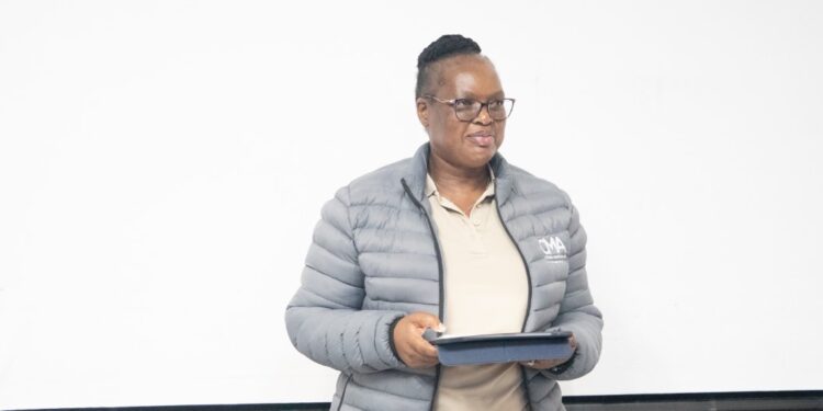 Deputy Governor of the Central Bank of Eswatini, Felicia Dlamini Kunene, speaking during the launch of the UNESWA Economics Society Mentorship Programme.