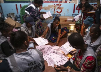 Election volunteers count ballots in Blantyre, Malawi, Tuesday, Sept. 16, 2025. (AP Photo/Thoko Chikondi)
