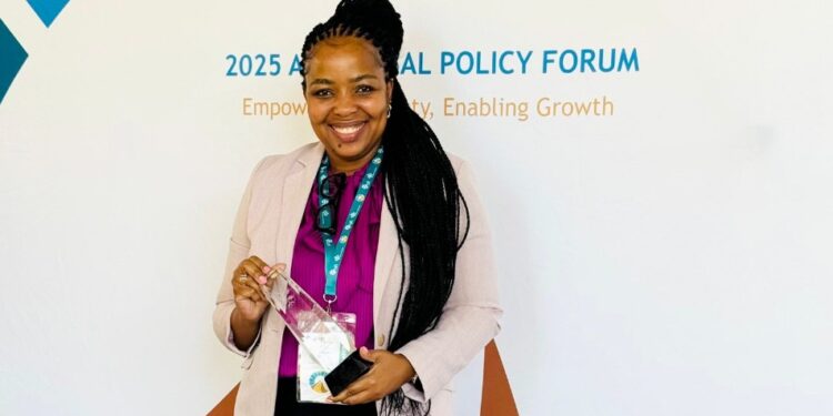 Linda Dlamini of the Central Bank of Eswatini after receiving the Technical Leadership Award from the Alliance for Financial Inclusion.