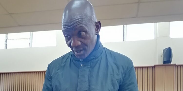 Mdzangwini community police officer Machawe Maduna in the Mbabane courtroom after being convicted of assaulting a civilian. Photo: Sithembiso Sihlongonyane