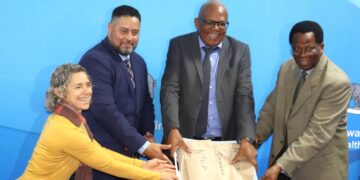 U.S. Embassy Chargé d’Affaires Marc Weinstock handing over the donated vehicles to Principal Secretary Khanyakwezwe Mabuza.
