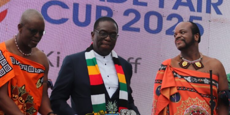 Zimbabwe President Emmerson Mnangagwa delivers his speech at the 57th Eswatini International Trade Fair as His Majesty King Mswati III looks on during the opening ceremony in Manzini