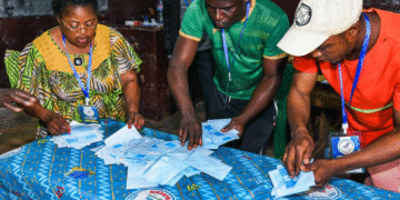 Election officials count ballots at a polling station in Yaounde, capital of Cameroon, on Oct. 12, 2025. (Xinhua/Kepseu)
